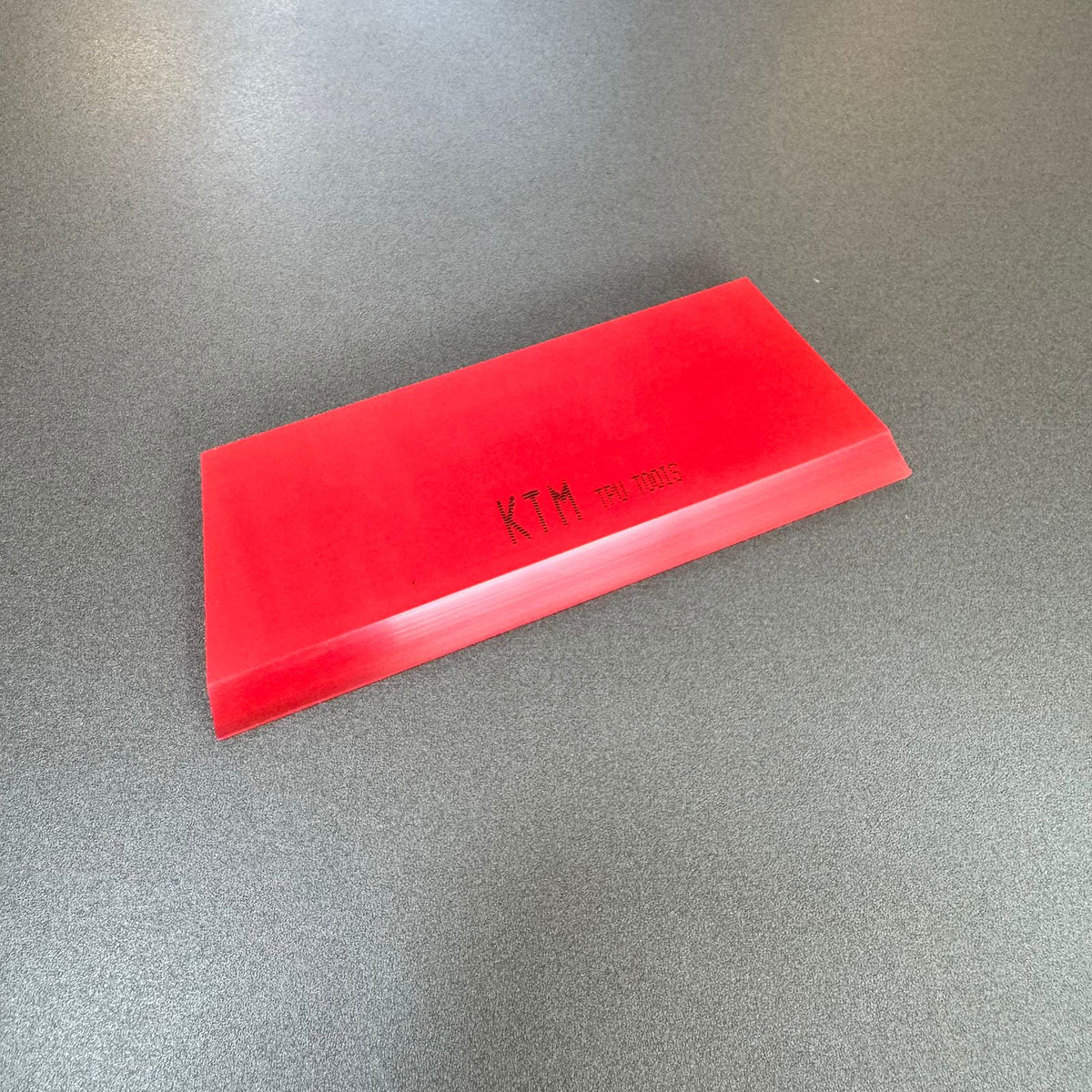 Borracha Vermelha KTM Media Rigidez 13x5cm p/ Aplicação de Películas